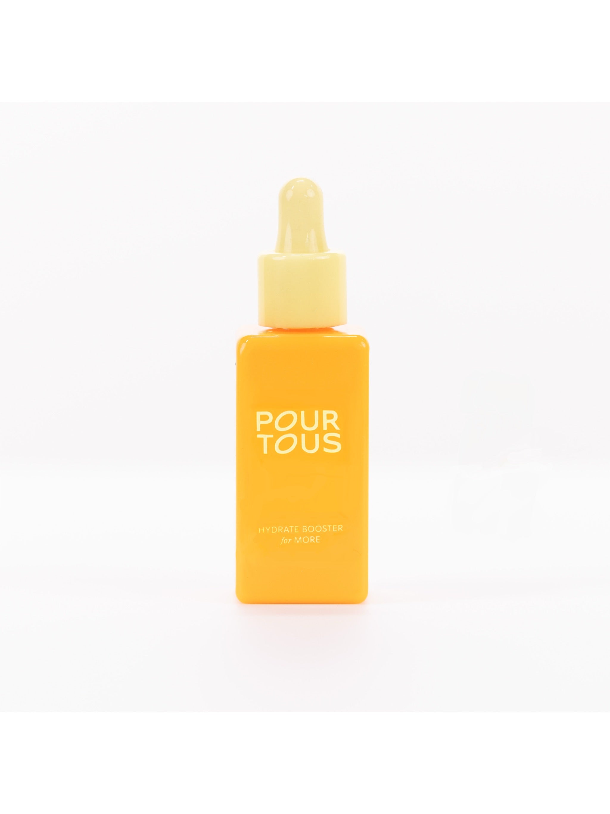 Yellow skincare serum bottle with dropper labeled Pour Tous.